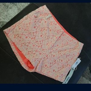 Floral peach and off white shorts